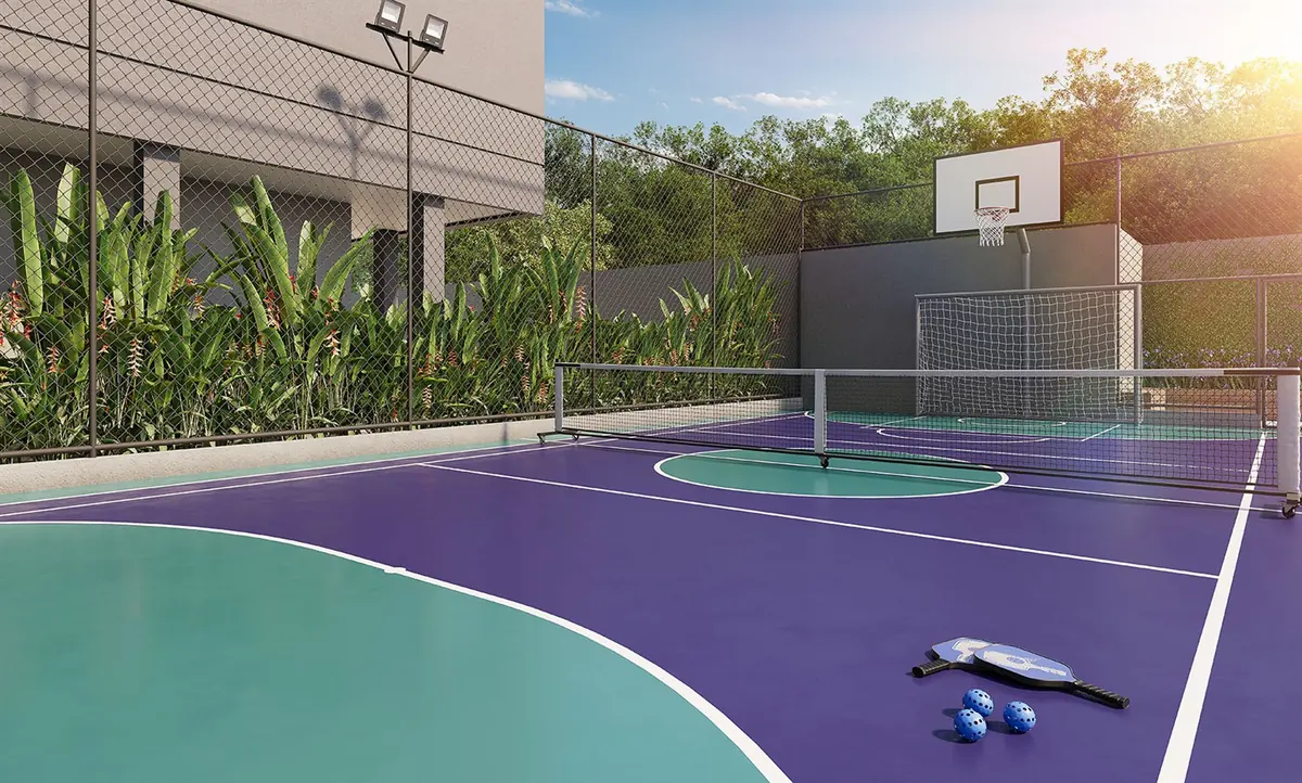 Sports court at Breeze Inspire Residence, with basketball markings and perimeter fencing