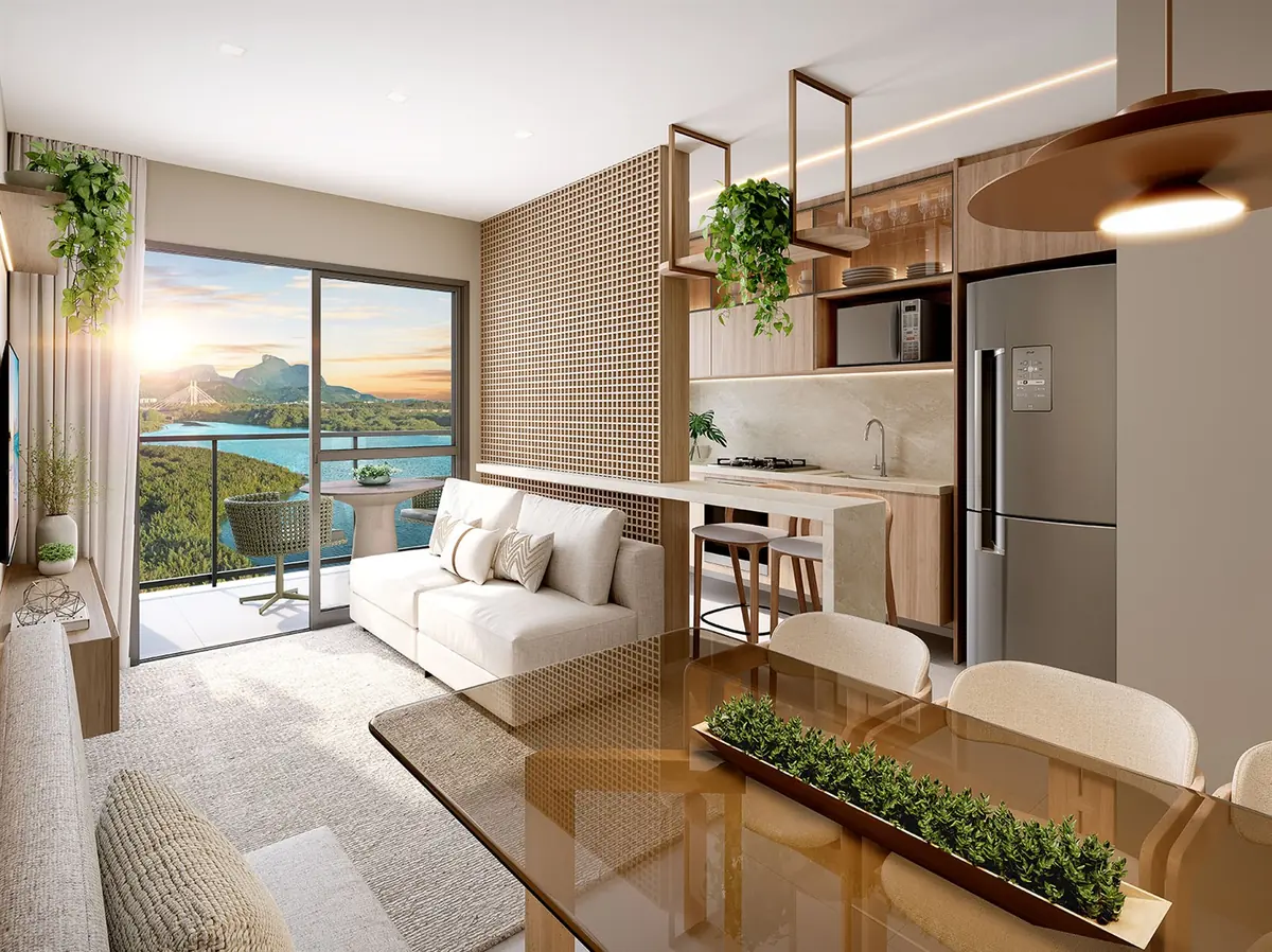 Living room and kitchen combined in a Breeze Inspire Residence apartment, with the balcony beyond