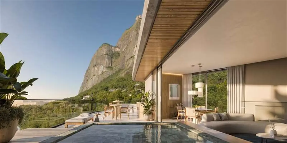 Varanda de cobertura do Vista Joá com piscina privativa voltada para a mata e as montanhas de São Conrado
