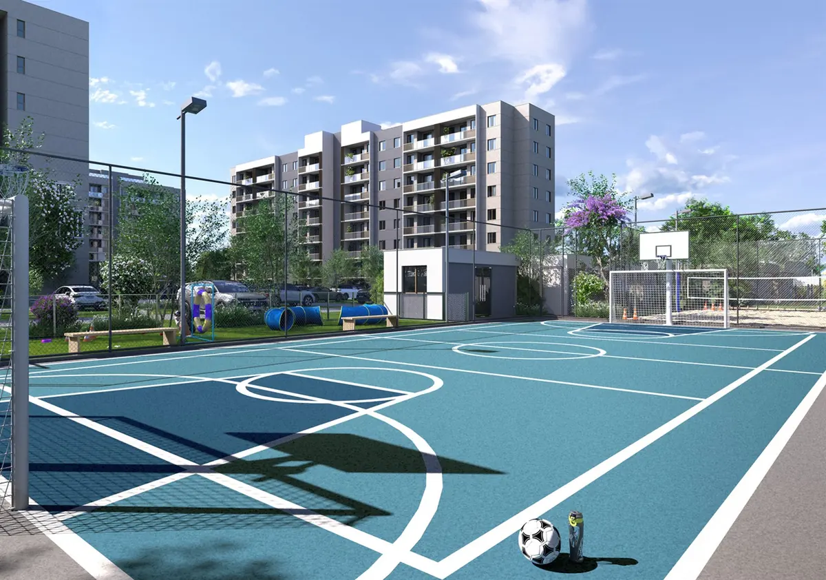 Quadra poliesportiva do Vitale Tide, com marcação de futebol e basquete e alambrado